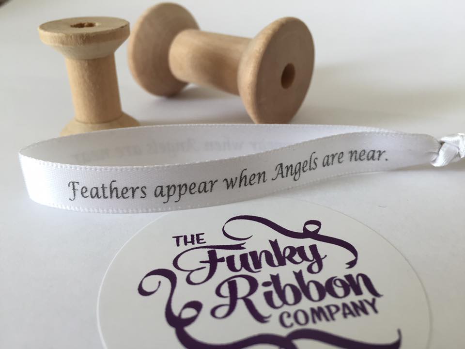 Feathers appear when Angels are near ribbons. image 0