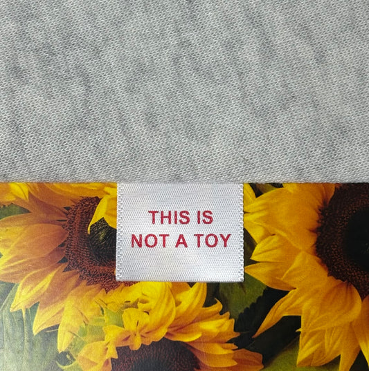 25MM THIS IS NOT A TOY labels image 1