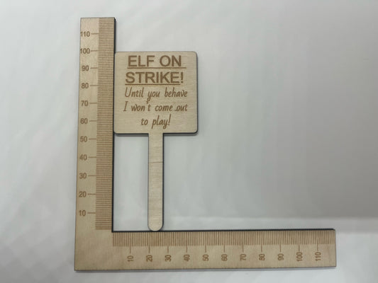 Elf on strike sign