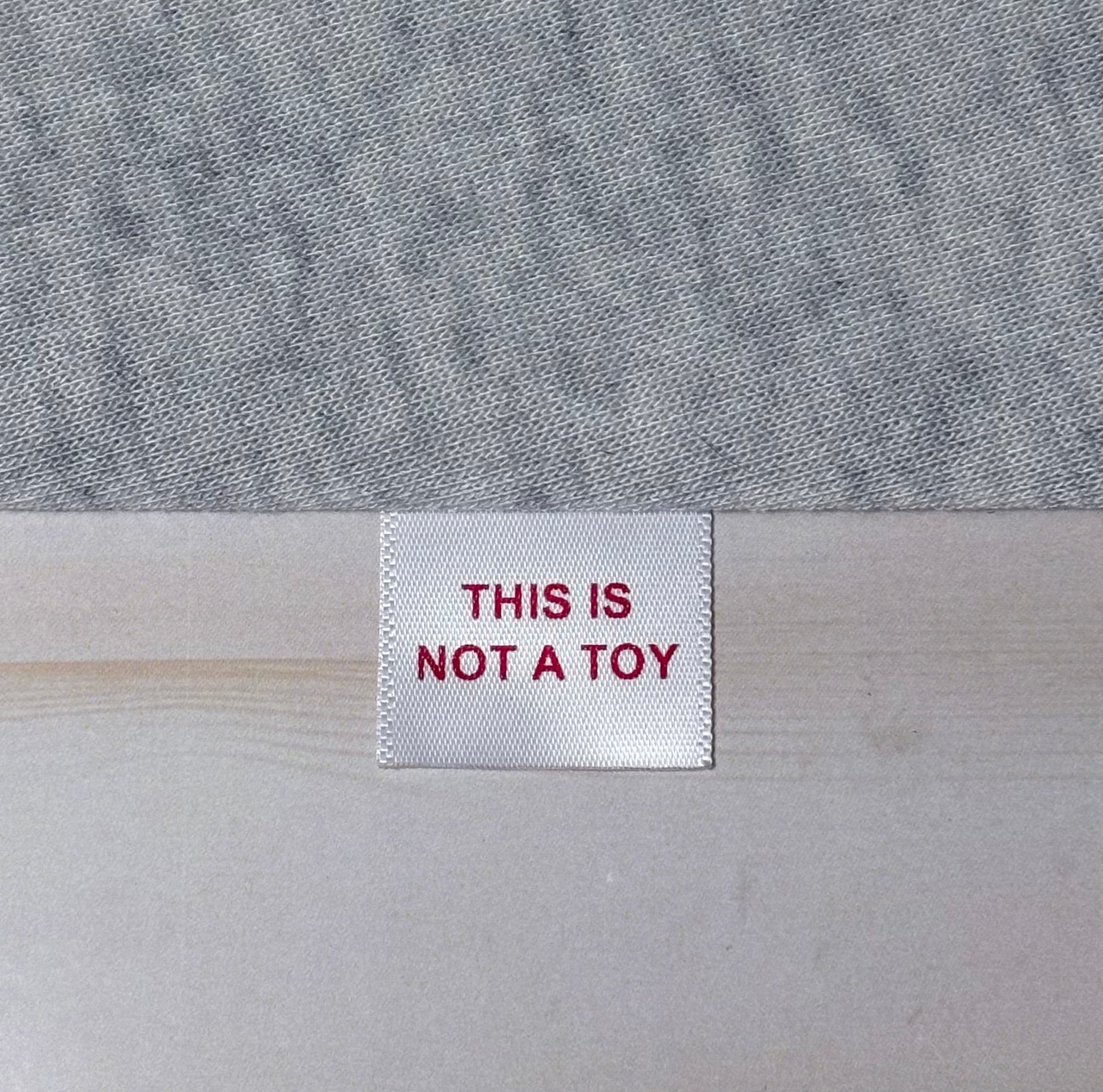 25MM THIS IS NOT A TOY labels image 2