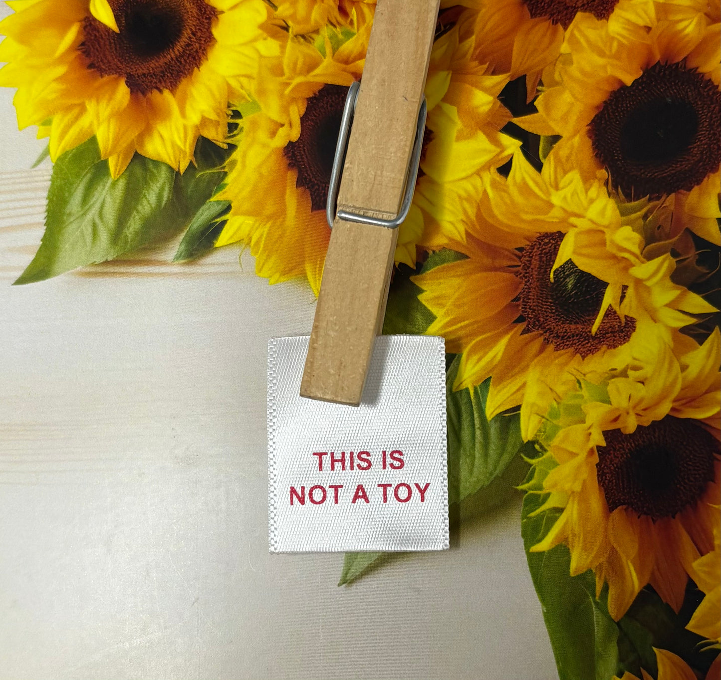 25MM THIS IS NOT A TOY labels image 0