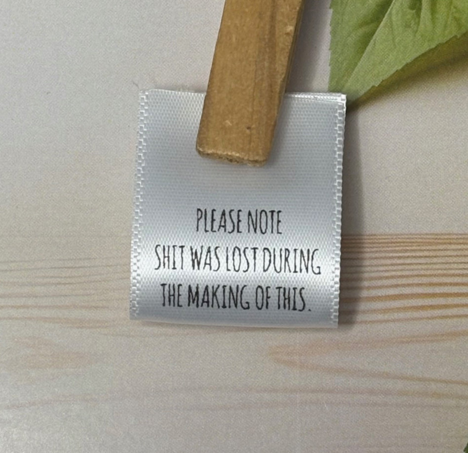 25mm labels funny sew in labels - Please note shit was lost image 0